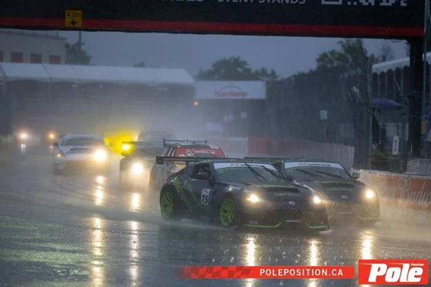 Solidxperts race cars 89 and 75 driving at GP3R in the rain